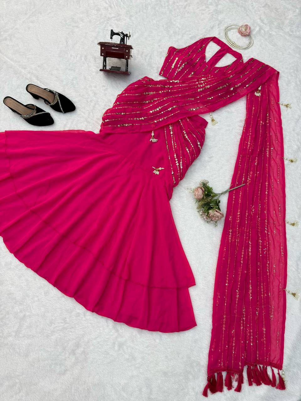 Radiant Rani Pink Silk Lehenga Choli Adorned with Opulent Heritage Floral Motifs and Intricate Zari Borders